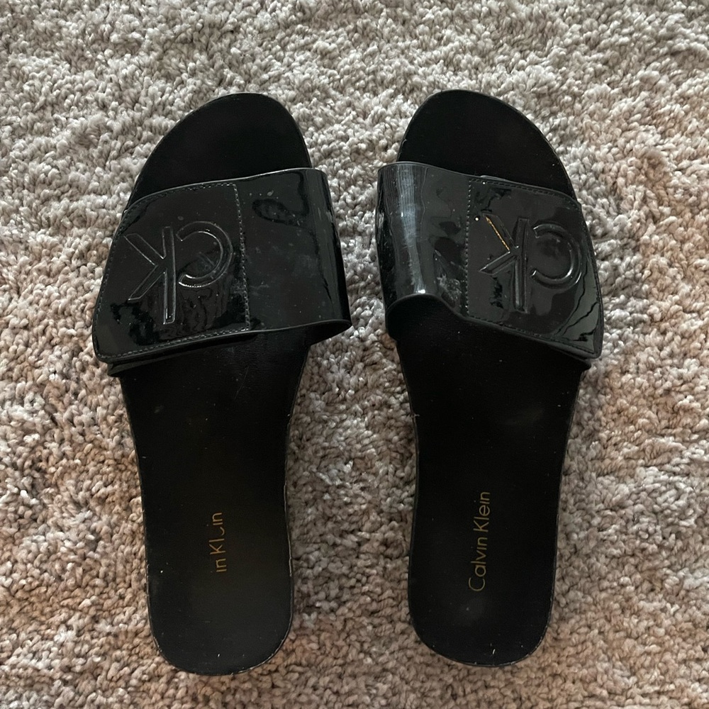 Black Calvin Klein slides size 7